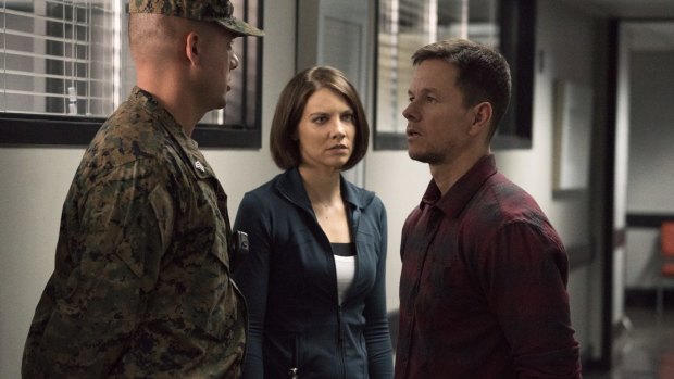 Mark Wahlberg (right) and Lauren Cohan in Mile 22. 