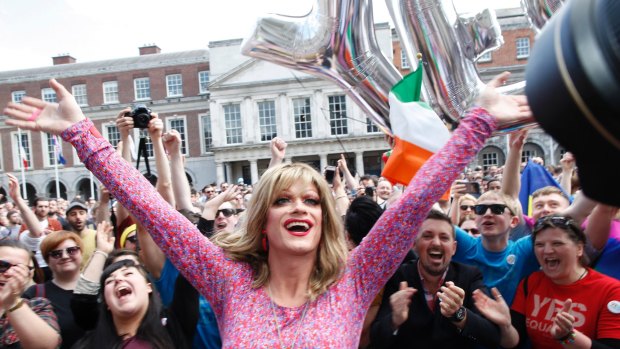 Rory O'Neill, known by the Drag persona Panti, celebrates with yes supporters at Dublin Castle after the result of Ireland's same-sex marriage vote was announced in 2015.