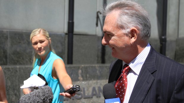 Lawyer Eugene O'Sullivan leaves the Brisbane Magistrates Court on Monday after describing the alleged rape as a "Jackass-type of thing".