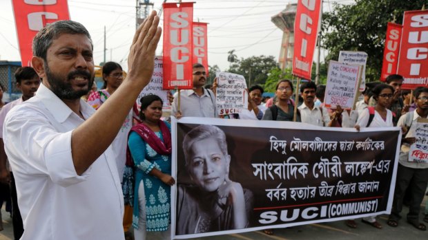 Activists march at a demonstration against Lankesh's killing in Kolkata.