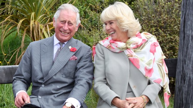 Prince Charles and Camilla share a laugh during their visit to New Zealand on November 5.