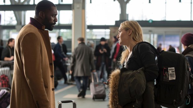 The filmmakers don't bother with the initial antagonism of  the romance formula for Ben (Idris Elba, left) and Alex (Kate Winslet).