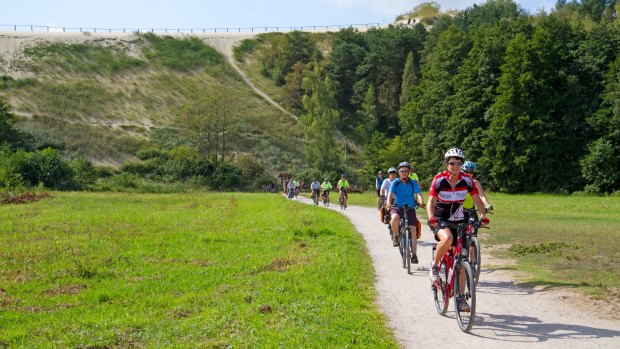 Cycling at the foot of Parnidis Dune.