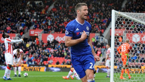 Chelsea's Gary Cahill celebrates after scoring during an English Premier League match against Stoke City, 2017.