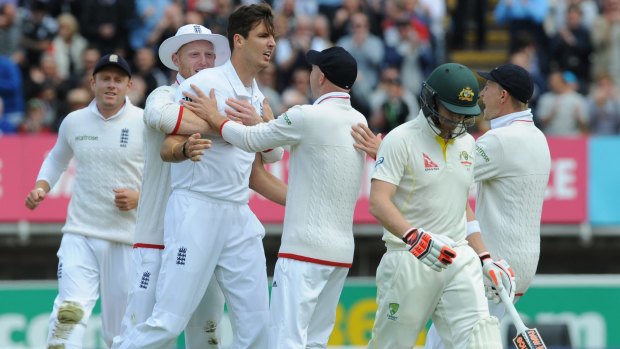 Strong return: England's Steven Finn celebrates bowling Australia's Steven Smith.