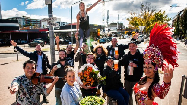 Braddon business owners and performers get into the party mode on Lonsdale Street.