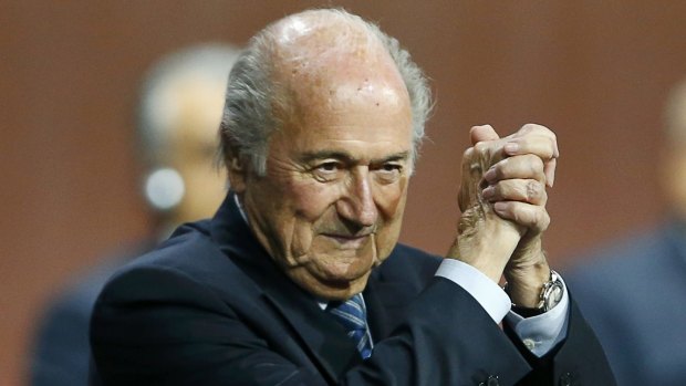 FIFA President Sepp Blatter gestures as he is re-elected in Zurich.