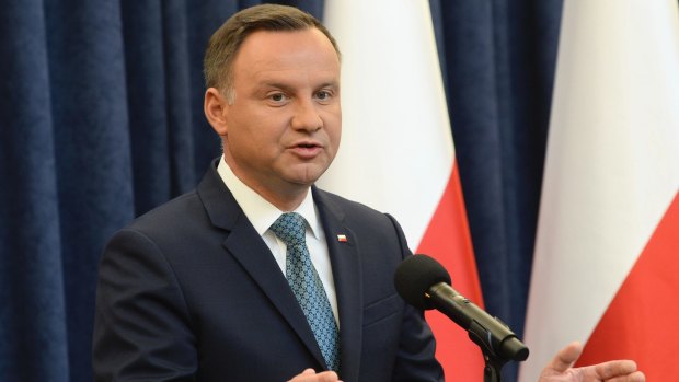 Polish President Andrzej Duda, in Warsaw, announces that he will veto two contentious bills widely seen as assaults on the independence of the judicial system, July 24, 2017.