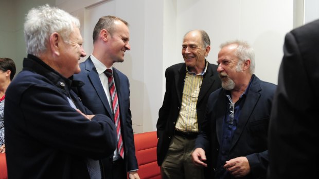Chief Minister Andrew Barr, second from left, with former Labor figures Wayne Berry, second from right, and David Lamont, right. 