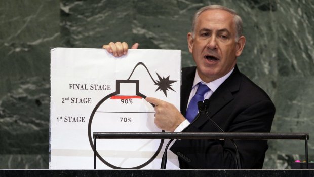 Israeli Prime Minister Benjamin Netanyahu raises his concerns about Iran's nuclear ambitions during an address to the United Nations in 2012.