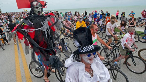 Riders dressed as zombies take part in the Zombie Bike Ride in Key West, Florida, on Sunday.