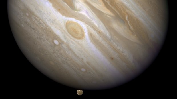 Jupiter with one of its moons, Ganymede, which has an ocean under its surface.