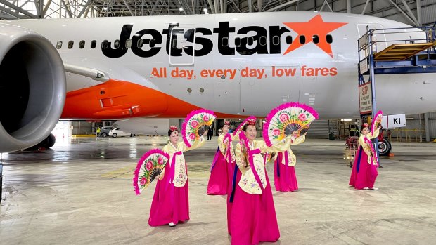 Dancers perform at the announcement of Jetstar flights from Sydney to Seoul at Sydney Airport on Friday.