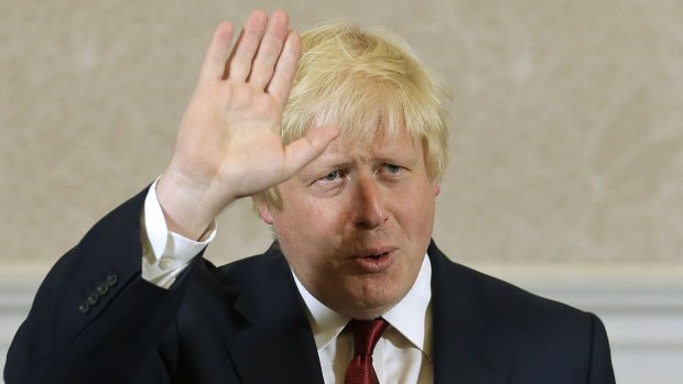 Former London mayor Boris Johnson waves after announcing he will not run for leadership.