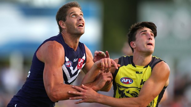 Fremantle's Aaron Sandilands and Tiger Ivan Soldo contest the ruck during their NAB Challenge match. 