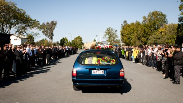A guard of honour was formed as Reece Harding was taken for burial.