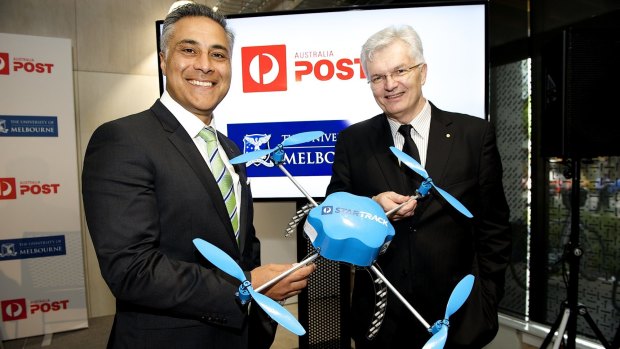 Australia Post CEO Ahmed Fahour and University of Melbourne vice-chancellor Glyn Davis. The postal service will trial drone deliveries next year.