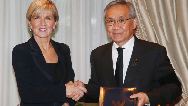 Julie Bishop shakes hand with her Thai counterpart Don Pramudwinai during the signing of Thai-Australia Air Service agreement.
