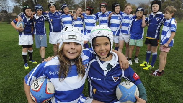 Royals under-10 rugby union team, with Dusty-Rose Bates, left, and Lizzy Marshall at the front.
