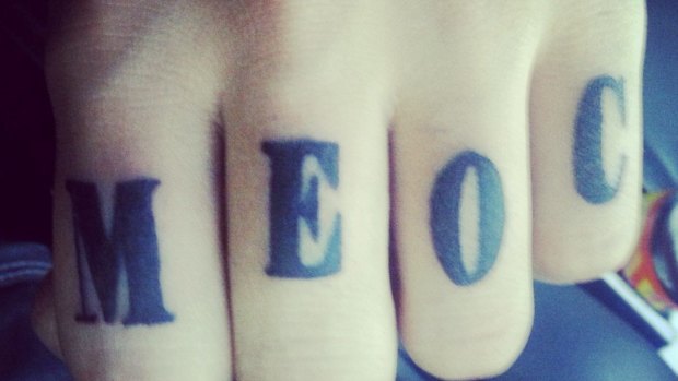 Adam Dowidar's knuckles tattooed with MEOC, which stands for Middle Eastern Organised Crime.
