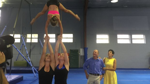 Premier Campbell Newman and wife Lisa watch gymnastic students work out at Mitchelton Youth Club.