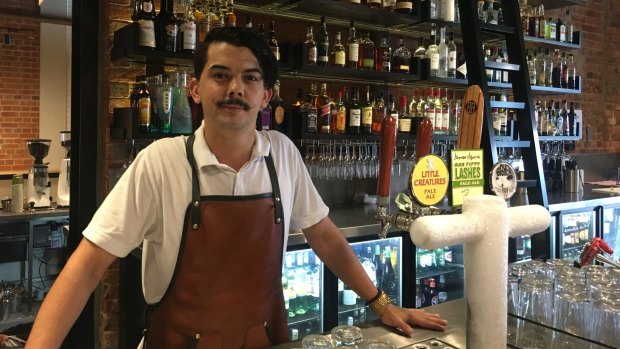 Bartender Kallum Sander, from Headricks Lane, a trendy Rockhampton microbrewery bar.