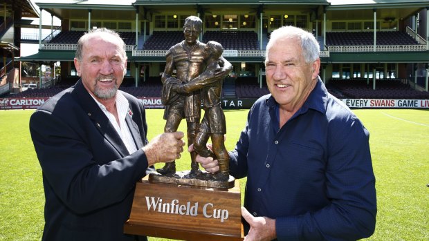Three decades later ... Ray Price and Mick Cronin hold the 1986 premiership trophy aloft at the SCG.