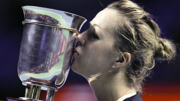 Anastasia Pavlyuchenkova kisses her trophy.