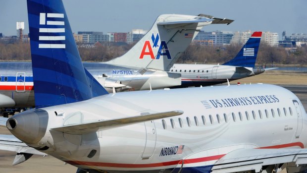An American Airlines plane was forced to return to the gate before takeoff after apassenger noticed a spooky Wi-Fi name.