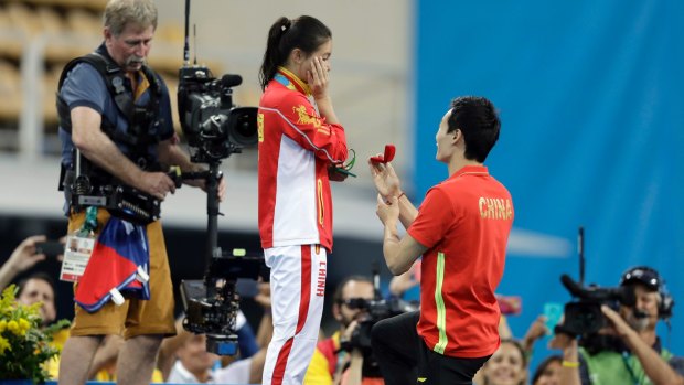 Qin Ki gets down on one knee at the aquatic centre.