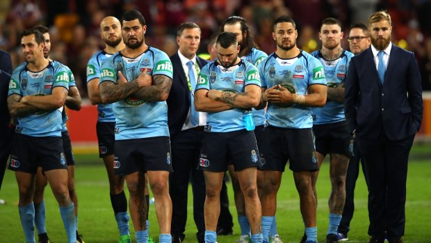 Familiar scenes: Dejected Blues players come to terms with another series defeat.