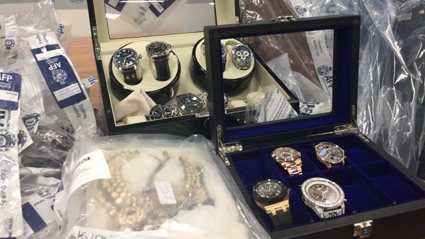 Police have seized hundreds of items, including watches, cars, motorbikes, airplanes, properties and cash.