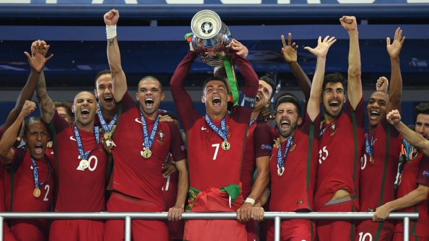Finally: Cristiano Ronaldo lifts the European Championship trophy for the first time in Portugal's history.