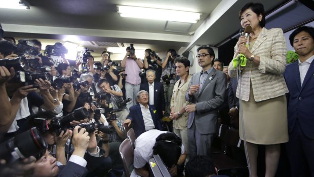 Former defence minister Yuriko Koike speaks following her victory in the Tokyo gubernatorial election.