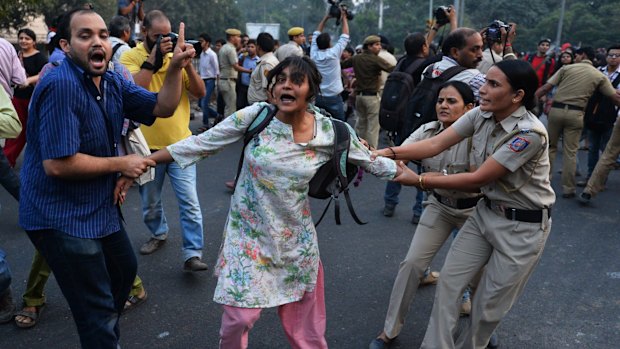 Indian police in Delhi attempt to stop 'Kiss of Love' protesters from marching on the headquarters of the RSS, a Hindu nationalist organisation linked to India's ruling Bharatiya Janata Party.