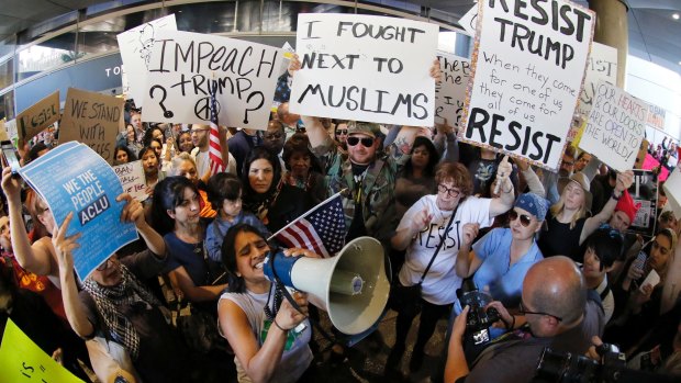 Demonstrators at Los Angeles International Airport protest President Trump's travel ban in January.