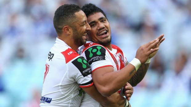 Winning feeling: Benji Marshall and Peter Mata'utia celebrate.