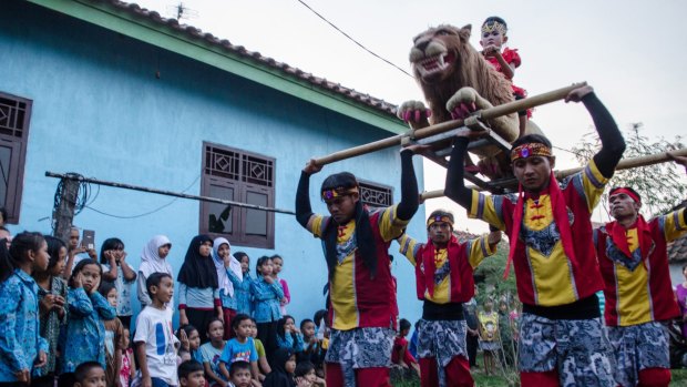 Seven-year-old Disty at the ceremony to mark the circumcision she had at birth. 