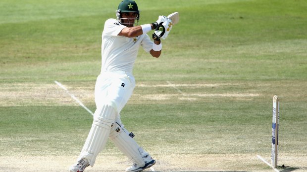 Pakistan captain Misbah-ul-Haq hits a boundary en route to the fastest Test half-century in Abu Dhabi on Sunday.