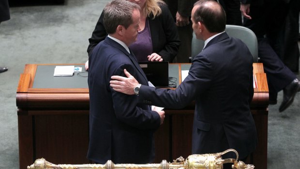 Bill Shorten and Tony Abbott in discussion after delivering statements on Malaysian Airlines flight MH17. 