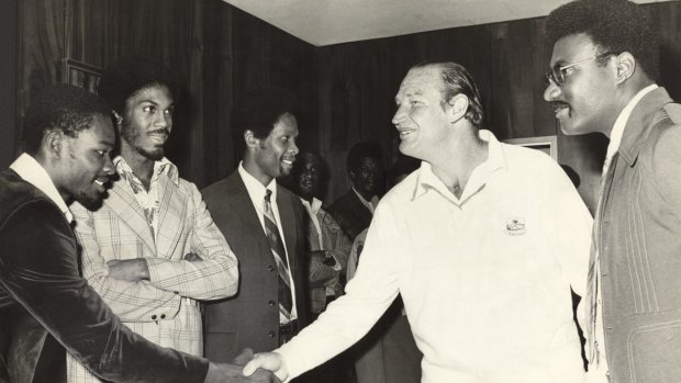 Night cricket pioneer: Clive Lloyd introduces his West Indies team to Kerry Packer in November 1977.