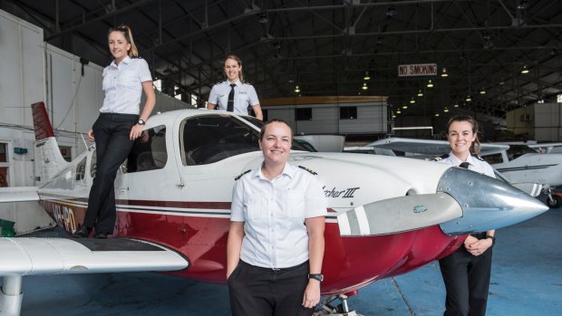 Women flying high: Pilot Tessa Beyersdorff with collegues Steph Barry, Amelia Andermahr and Kara Eggleston at Bankstown Airport's Sydney Flying School.