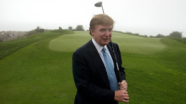 Donald Trump, pictured on one of his golf courses in 2002, has business interests around the world. 