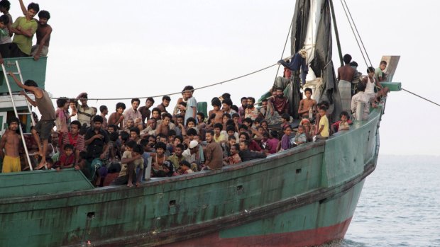 "Irregular migrants" pack a boat off the coast of Aceh province in Indonesia last month.