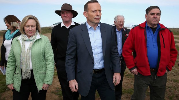 Agriculture Minister Barnaby Joyce, Prime Minister Tony Abbott and Minister for Trade and Investment, Andrew Robb at the Bellevale Homestead Cattle Yard in Yass.