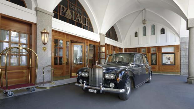 The hotel entrance and one of its many Rolls Royce cars.