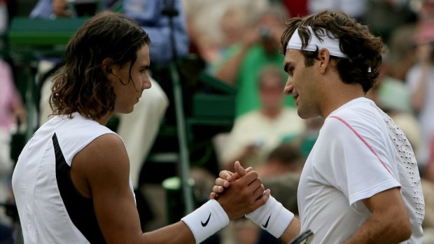 Roger Federer (right) shakes hands with Rafael Nadal after winning the men's final at Wimbledon in 2006.