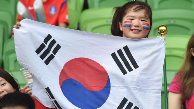 A South Korean fan at Thursday's quarter-final against Uzbekistan.