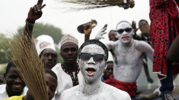 Nigerians in Kaduna celebrate Muhammadu Buhari's victory in the presidential election. 