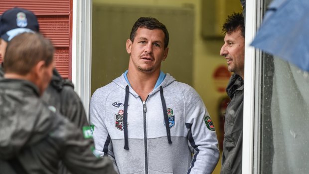 Back in the fold: Greg Bird joins Laurie Daley and his former Blues teammates at their Coffs Harbour training base.